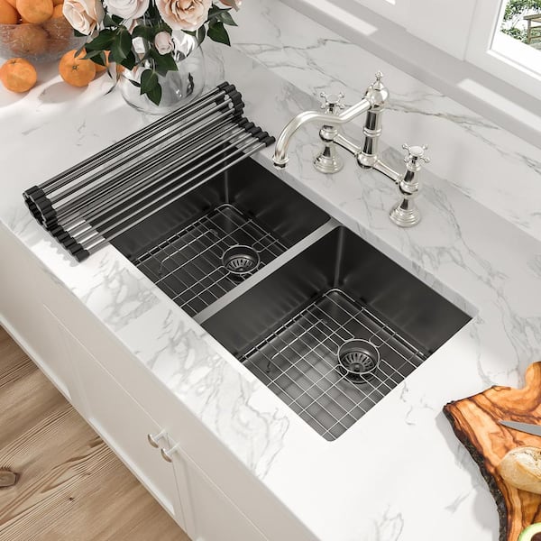 https://images.thdstatic.com/productImages/38eaaaa4-433e-4c2f-b7a2-aa43e3260237/svn/black-undermount-kitchen-sinks-au3319b-4f_600.jpg