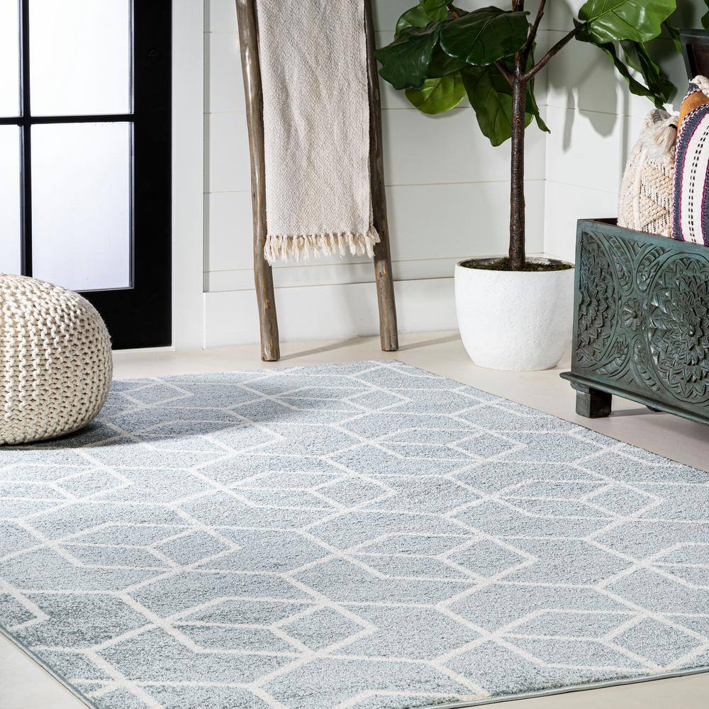 Light Blue and White Geometric 4' x 6' Area Rug