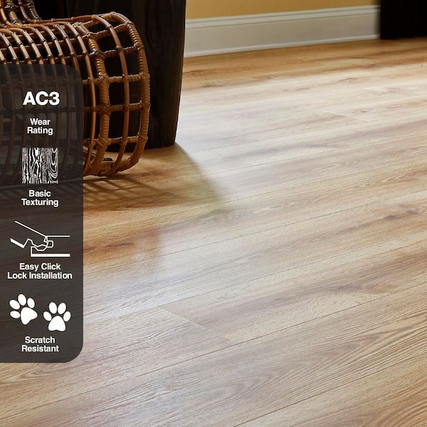 TrafficMaster Attie Creek Oak 7 mm T x 7.6 in. W Laminate Wood