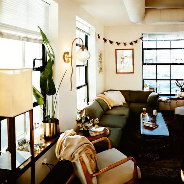 Modern 6 in. 1-Light Brass Wall Sconce with Smoky Grey Blown Glass Globe Contemporary Damp-rated Bathroom Vanity Light