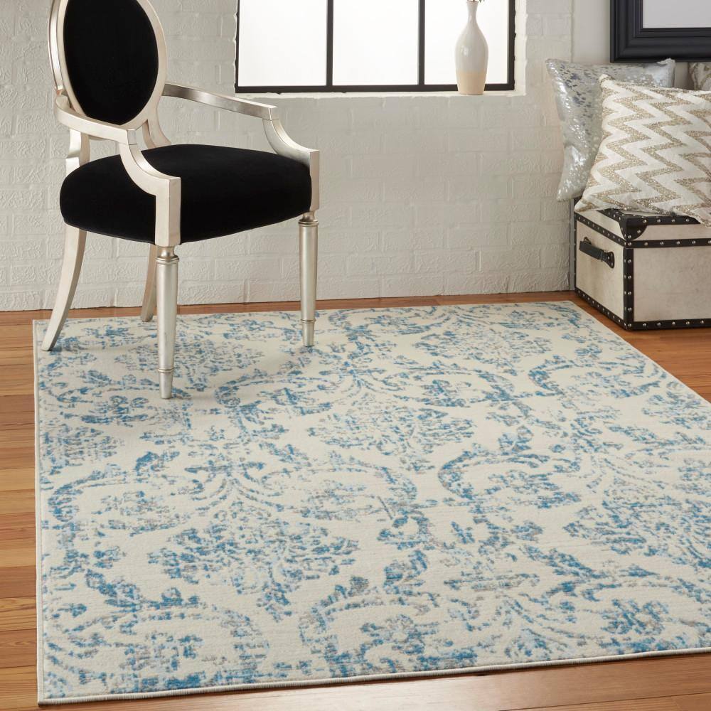 Elegant Ivory and Blue Damask 5' x 7' Synthetic Area Rug