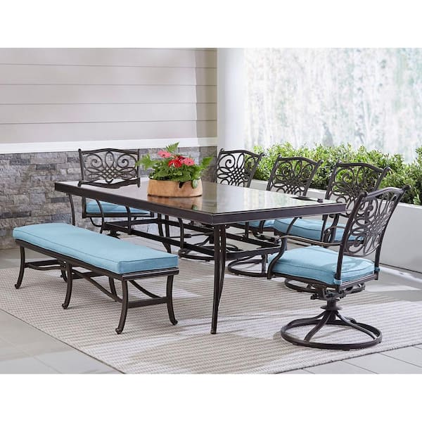 Hanover Traditions 7-Piece Aluminum Outdoor Dining Set with Blue Cushions with 5 Swivel Rockers and Glass-Top Table