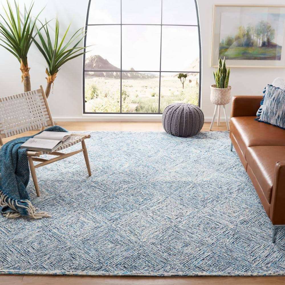 Ivory Hand-Tufted Wool 9' x 12' Rectangular Area Rug