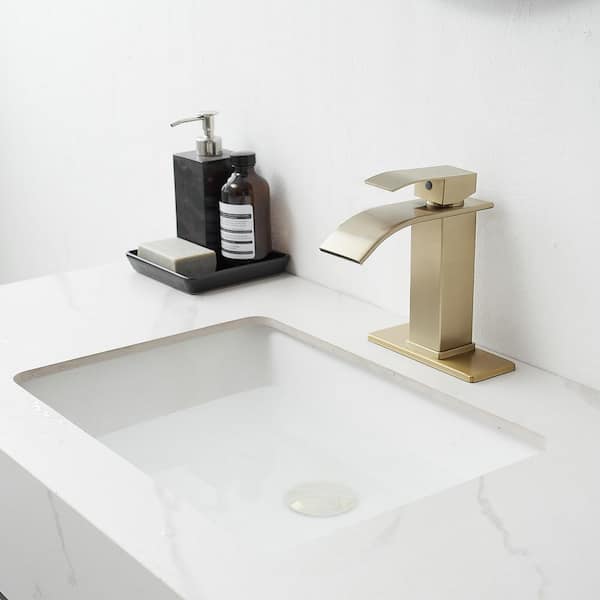 Waterfall Single Handle Single Hole Low-Arc Bathroom Faucet Bathroom With Drain Assembly Drip-Free in Brushed Gold