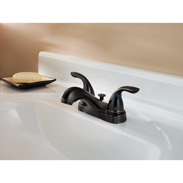 4 in. Centerset Double Handle Bathroom Faucet in Tuscan Bronze Drain Kit Included