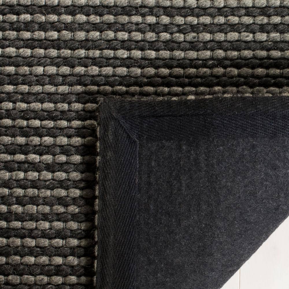 Handmade Black Wool and Synthetic Tufted Rectangular Rug