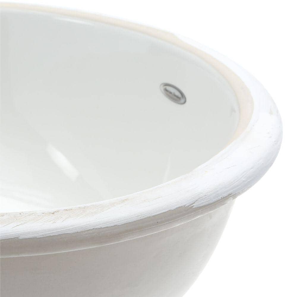 https://images.thdstatic.com/productImages/394f2e81-9ede-472a-bfad-83754df87225/svn/white-american-standard-undermount-bathroom-sinks-0495-221-020-66_1000.jpg