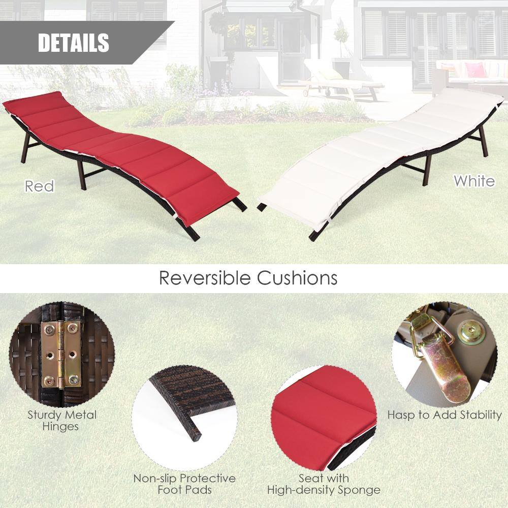 Detailed view of the reversible red and white cushions and metal hardware of the chaise lounger.