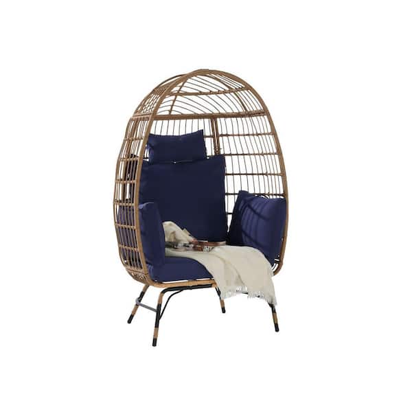 Single Wicker Outdoor Chaise Lounge with Dark Blue Cushions