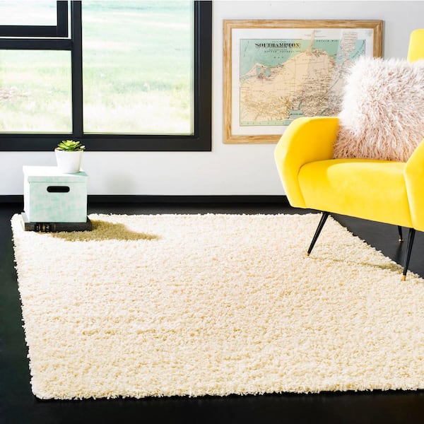 Modera 10 ft. x 14 ft. Ivory Solid Color Area Rug