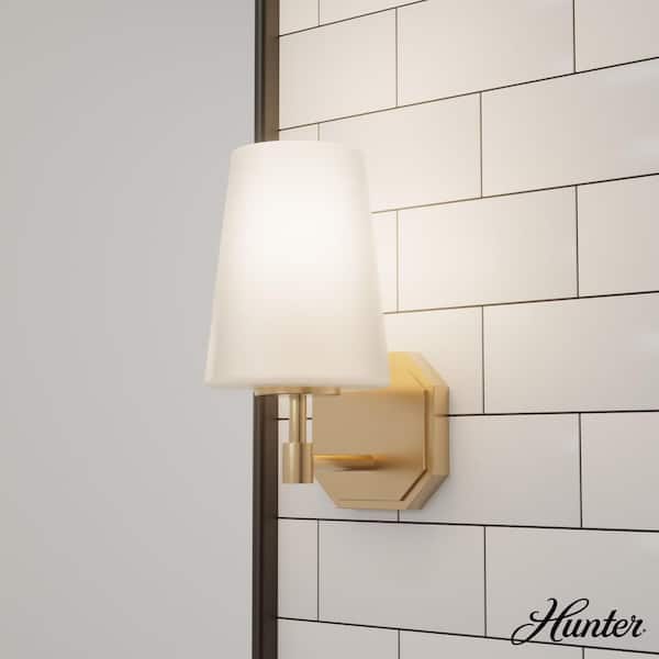 Hunter Nolita 1-Light Alturas Gold Wall Sconce with Cased White Glass Shade