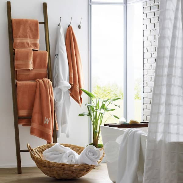 https://images.thdstatic.com/productImages/3980ff3a-dbf2-49d0-90f1-68c353de1d6c/svn/taupe-the-company-store-bath-towels-59057-bsh-taupe-a0_600.jpg