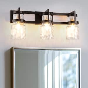 23 in. 3-Light Black and Gold Industrial Cylinder Vanity Light for Bathroom Mirror with Water Glass Shades