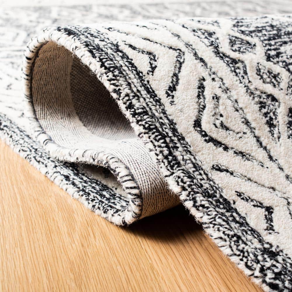 Handmade Black and Ivory Wool Abstract 9' x 12' Area Rug