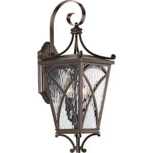 Cadence Collection 2-Light Oil Rubbed Bronze Clear Water Seeded Glass Luxe Outdoor Medium Wall Lantern Light