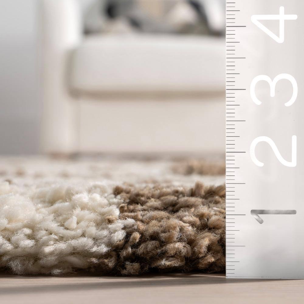 Beige and Brown Checkered Shag Synthetic Area Rug 6' x 9'