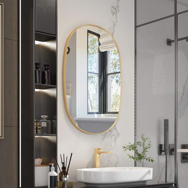 24 in. W x 36 in. H Oval Framed Wall Bathroom Vanity Mirror in Brushed Gold