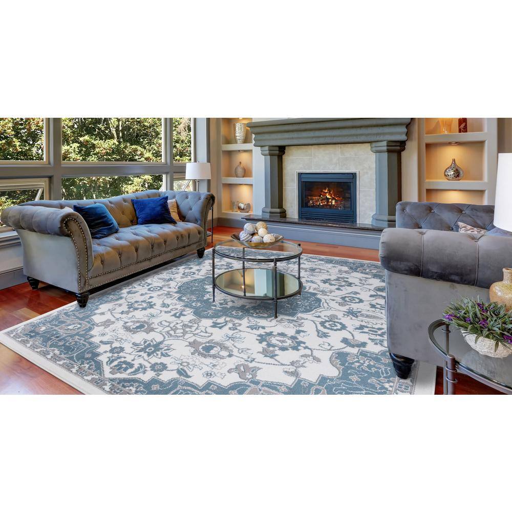 Ivory and Blue Medallion Synthetic 8' x 10' Area Rug