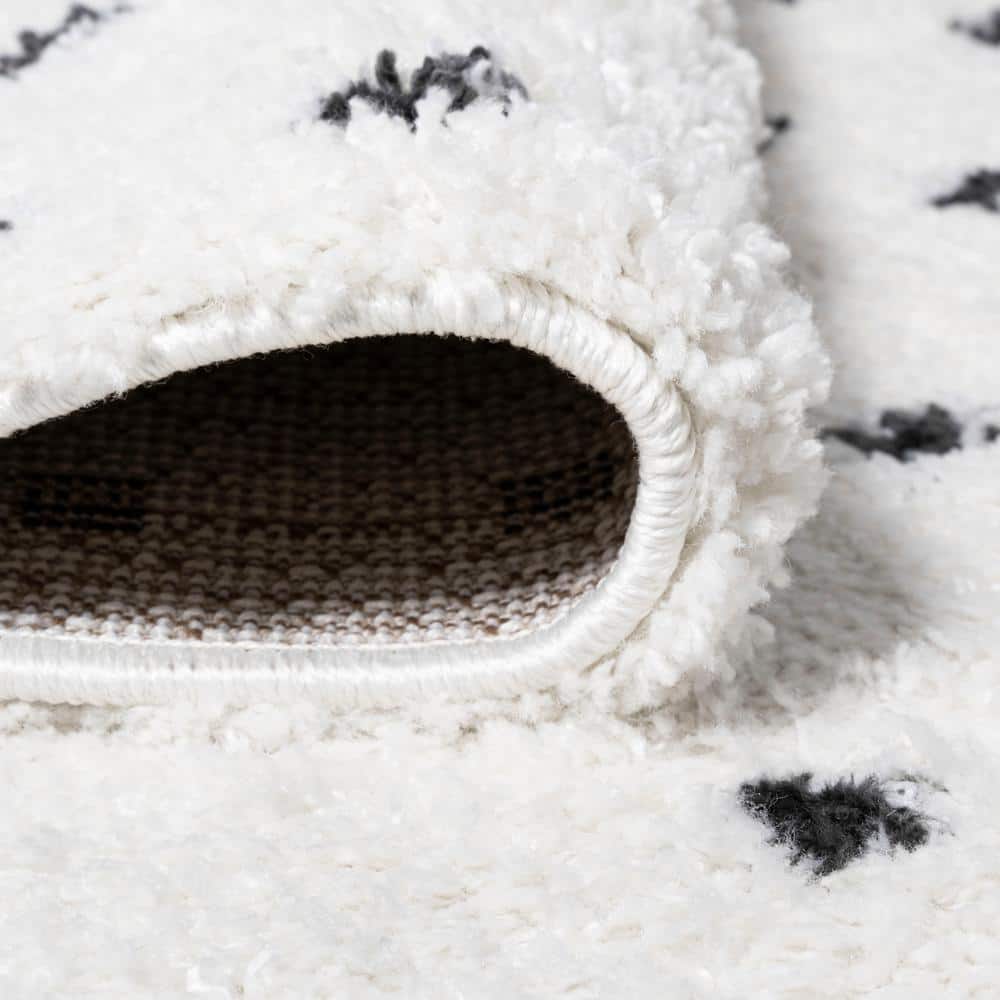 Ivory and Black Geometric Dot Shag 4' x 6' Area Rug
