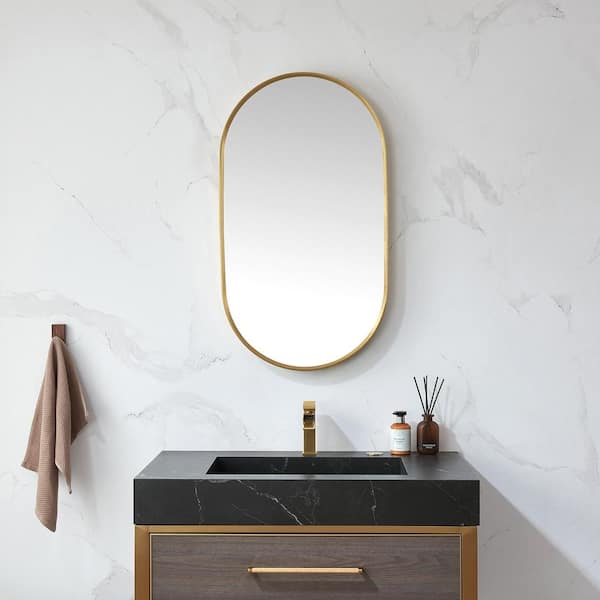 Miajadas 20 in. W x 36 in. H Metal Framed Oval Bathroom Vanity Mirror in Gold