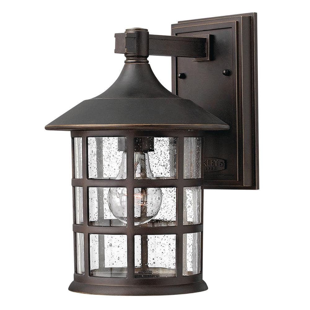 Freeport Classic Bronze Outdoor Wall Sconce with Clear Seedy Glass