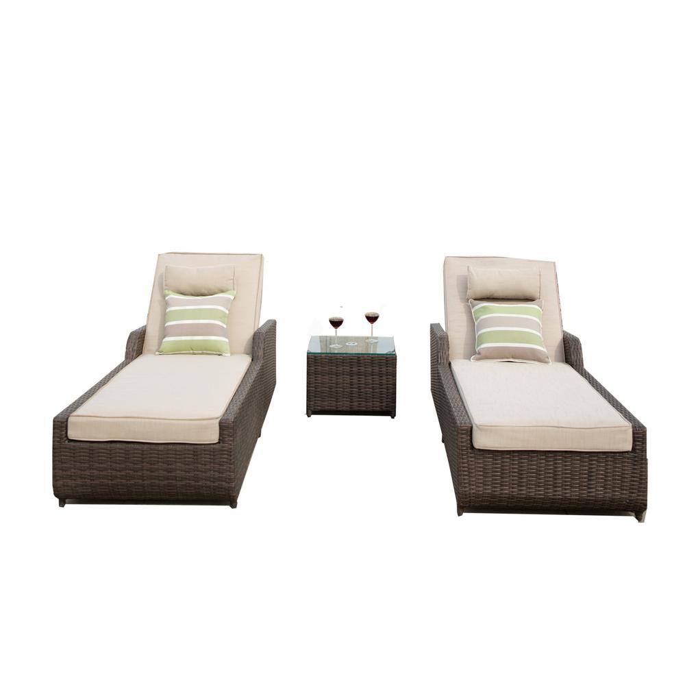 Three-piece brown wicker patio set including two chaise lounges and a side table.