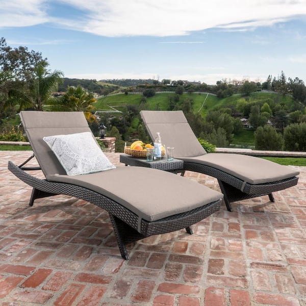 Noble House Miller Grey 3-Piece Faux Rattan Outdoor Chaise Lounge and Table Set with Charcoal Cushions