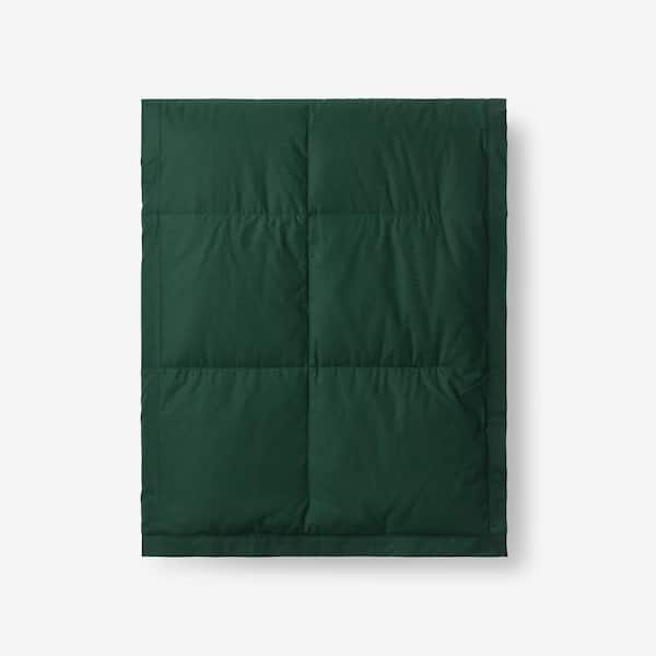 https://images.thdstatic.com/productImages/3a313860-7d4d-4916-8744-877a84c36a47/svn/hunter-green-the-company-store-throw-blankets-11182b-os-hntrgrn-64_600.jpg