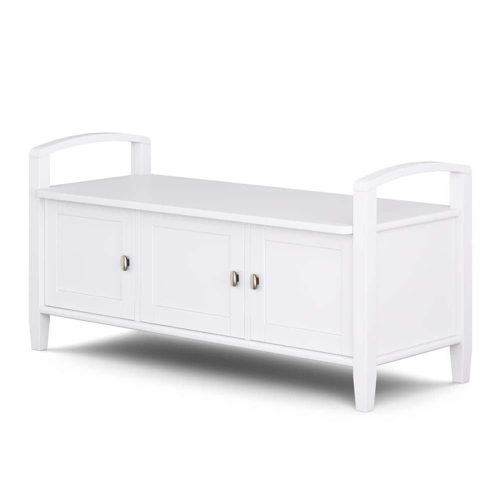 White solid wood entryway storage bench viewed from a slightly different angle.