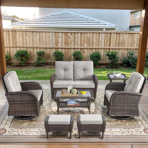 Brown 7-Piece Wicker Patio Conversation Set with Swivel Rockers, Outdoor Glider Seating Set with Beige Cushions