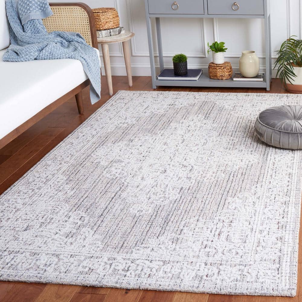 Ebony 6' x 9' Brown and Ivory Wool Tufted Area Rug