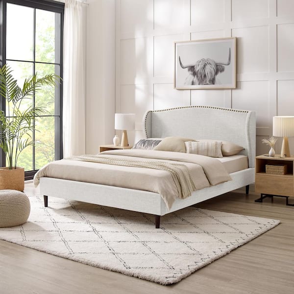 Upholstered nailhead outlet platform bed