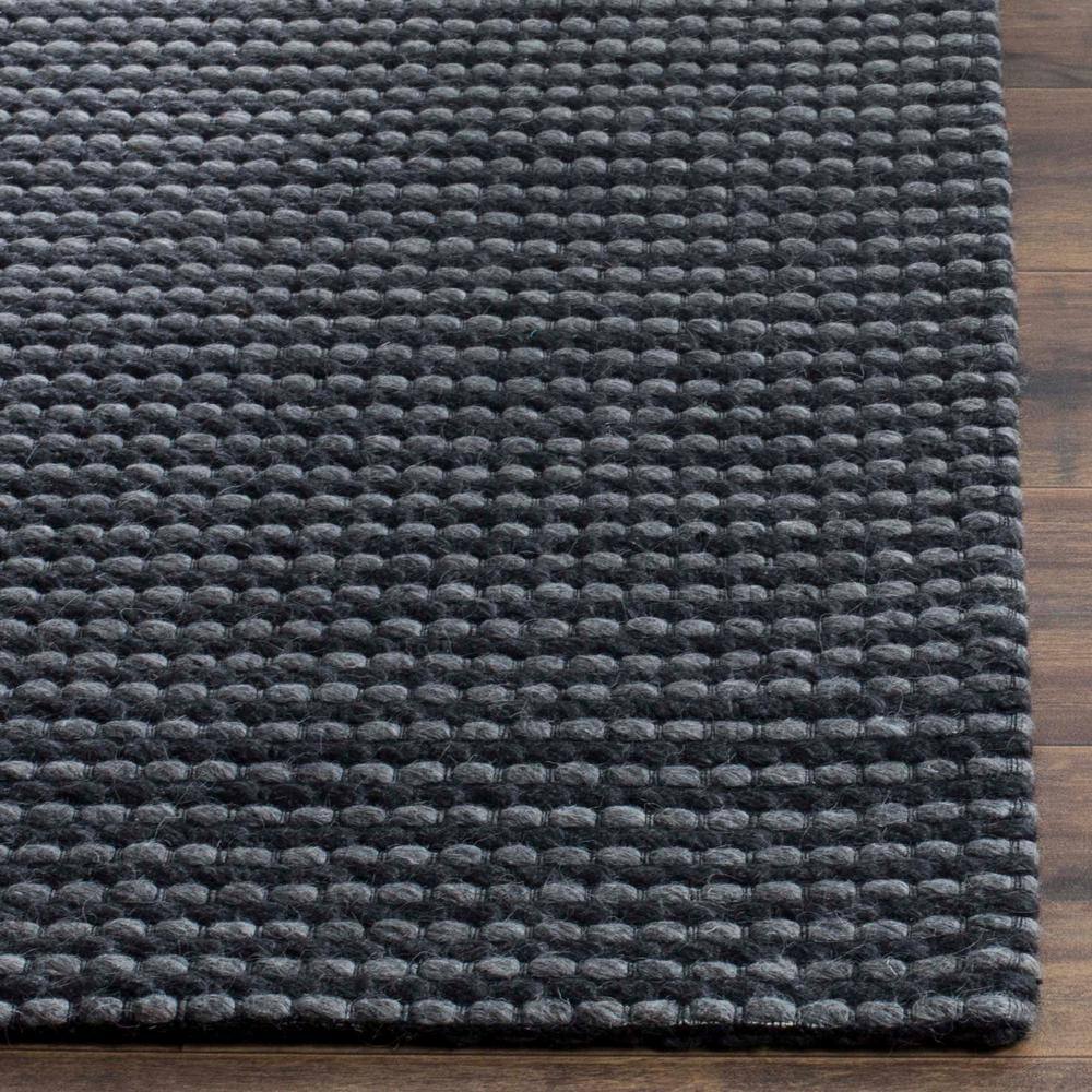 Handmade Black Wool and Synthetic Tufted Rectangular Rug