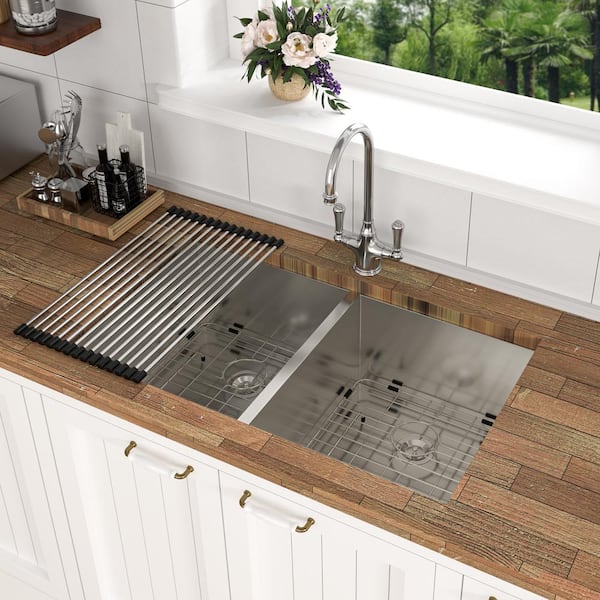 https://images.thdstatic.com/productImages/3a7b2fd5-73b9-48f1-a771-27309e20dbfe/svn/stainless-steel-heemli-undermount-kitchen-sinks-ss3319l03-31_600.jpg