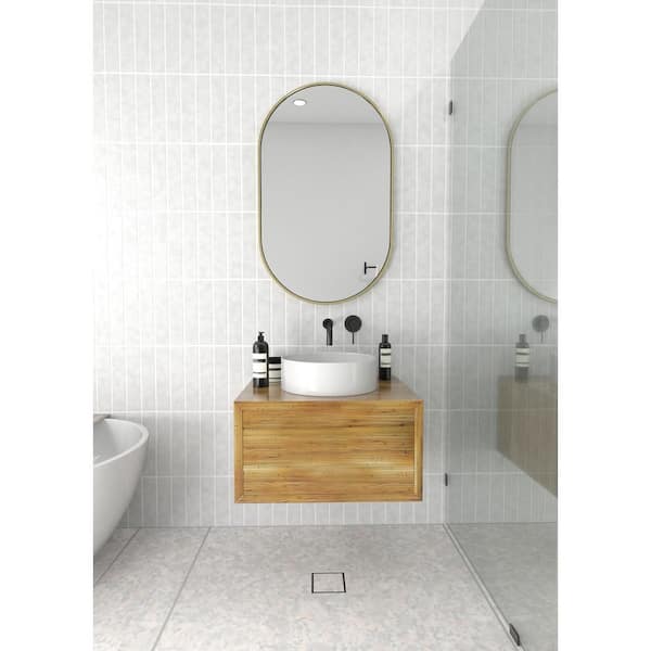 22 in. W x 36 in. H Framed Oval Bathroom Vanity Mirror in Satin Brass