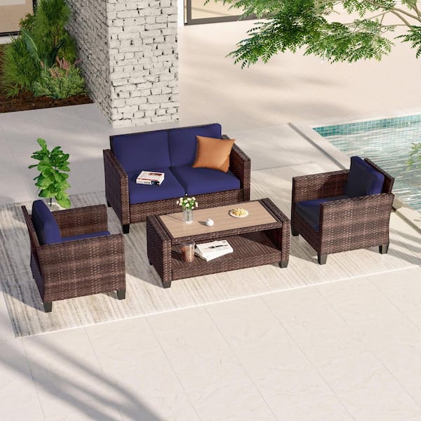 JOYESERY 4-Pieces Patio Conversation Set Outdoor Loveseat Sofa with Coffee Table Brown Wicker Removable Navy Blue Cushions