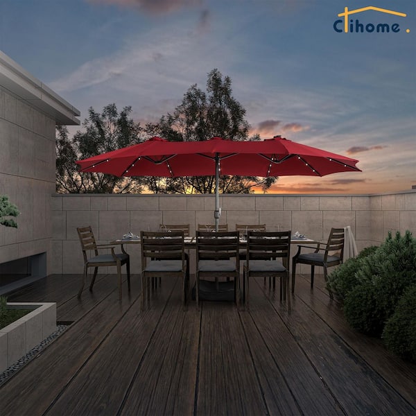 klismos patio umbrella Treasure Garden 13' Starlux AKZ PLUS Cantilever with Black Frame and Carbon Fabric vented design enhances stability in breezy conditions The Best Patio And Pool