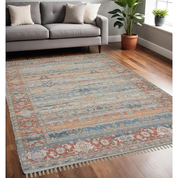 5 ft. x 7 ft. Blue Brick Red And Ivory Oriental Hand Woven Area Rug With Fringe