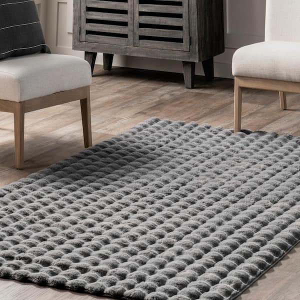 https://images.thdstatic.com/productImages/3a950cff-16c4-5bb4-9b0b-3a50d4dba6c7/svn/gray-nuloom-area-rugs-hjwr02b-3906-4f_600.jpg