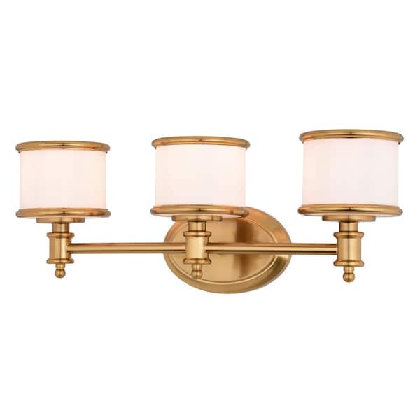 Carlisle 23 in. 3 Light Natural Brass Gold Vanity Light Traditional Bathroom Fixture White Glass