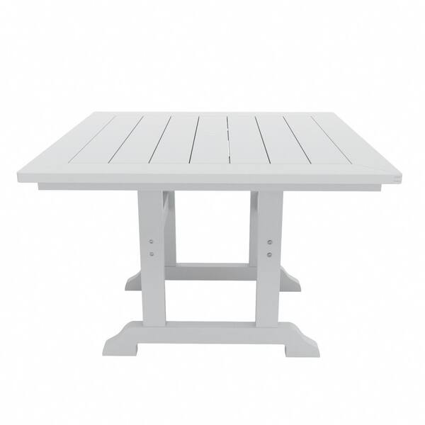 white plastic outdoor dining table