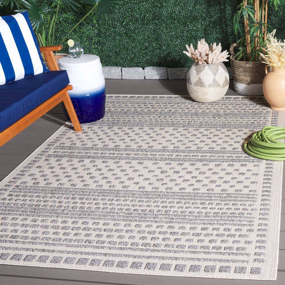 Gray and Beige Geometric 8' x 10' Synthetic Area Rug