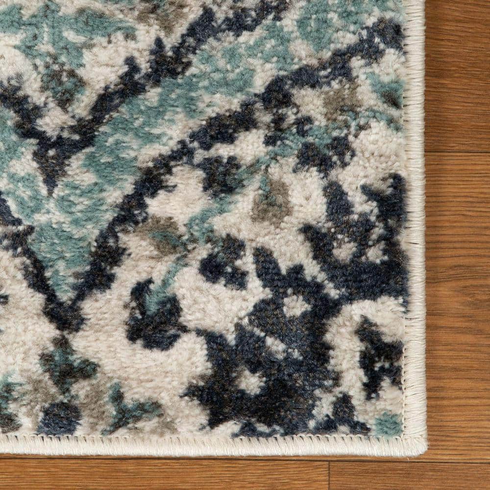 Deep Royal Floral Synthetic 7' x 9' Area Rug