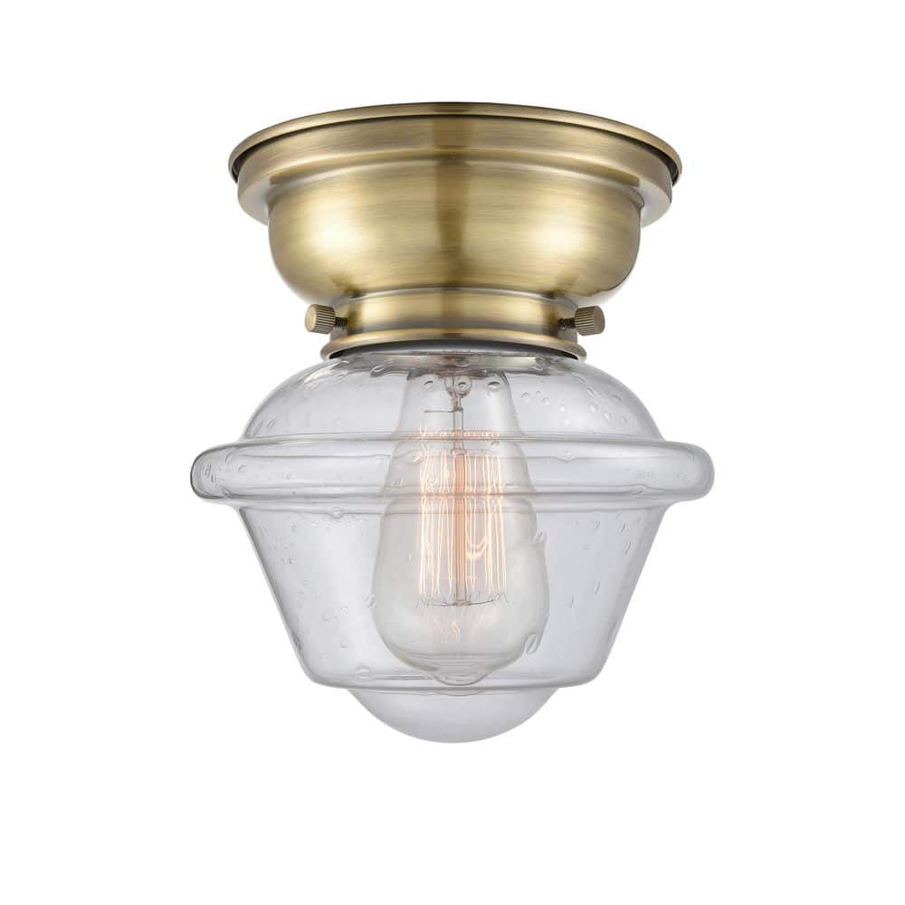 Oxford 7.5 in. 1-Light Antique Brass Traditional Flush Mount with Seeded Glass Shade price history on PriceWatchPro
