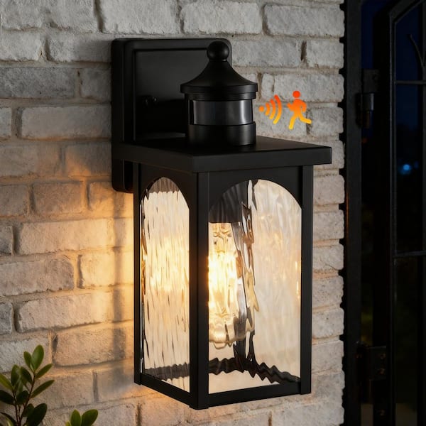 12 in. 1-Light Black Motion Sensing Dusk to Dawn Outdoor Hardwired Wall Lantern Sconce with Water Wave Clear Glass