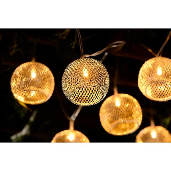 https://images.thdstatic.com/productImages/3b0015da-d5bb-4654-9628-41e444f3271d/svn/gold-hampton-bay-string-lights-10508-fa_600.jpg