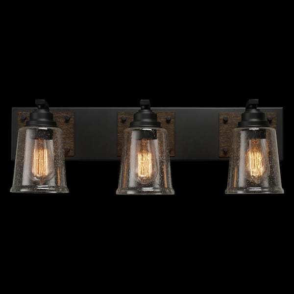 Warsaw 24 in. 3-Light Matte Black Vanity Light with Faux Wood Accents and Clear Seeded Glass Shades