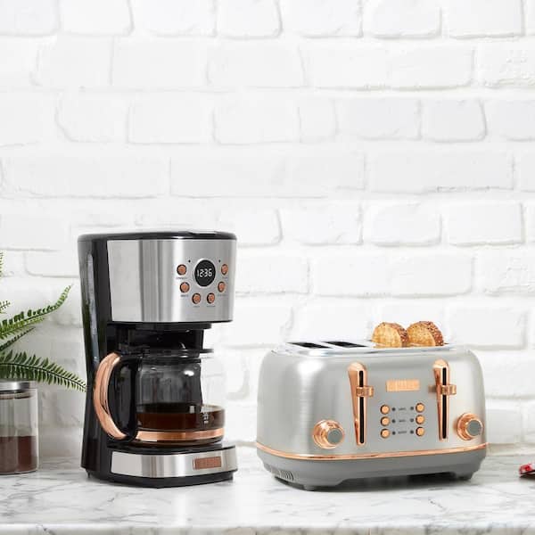 https://images.thdstatic.com/productImages/3b0f22ce-8166-49c7-9c87-226206a46b44/svn/stainless-steel-copper-haden-drip-coffee-makers-75121-e1_600.jpg