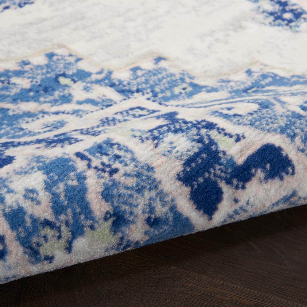 Ivory Blue Floral 4' x 6' Reversible Synthetic Area Rug