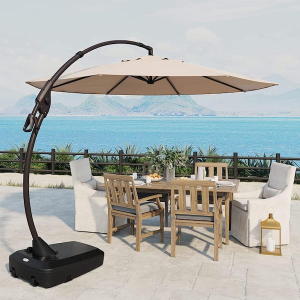 grand patio deluxe 10 foot curved aluminium offset umbrella 10x13 ft Patio with Base, Acrylic Outdoor Cantilever Aluminum Umbrella, 5-Year-Non-Fading Rectangular Umbrella with Cover the reinforced pole is made from powder coated aluminium.The outer umbrella has wheels for easy movement and the base needs to be filled with 265 lbs of sand and water to secure the umbrella Grand patio 11 FT Cantilever